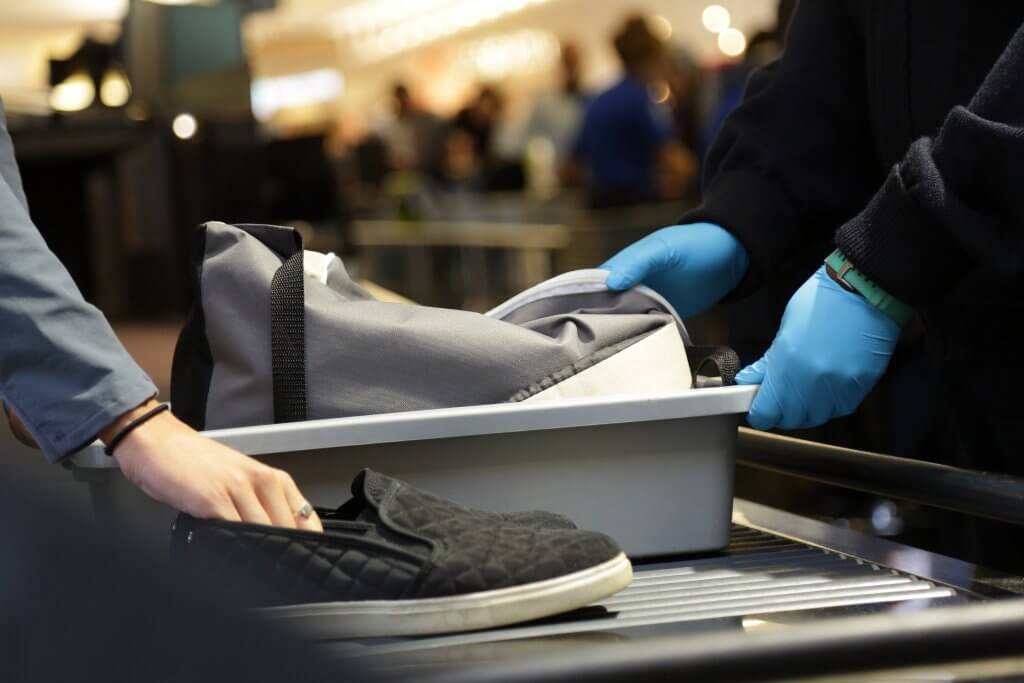placing shoes on security line